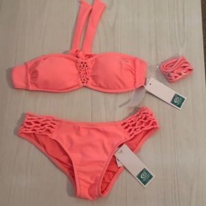 New, with tags, peach colored bikini